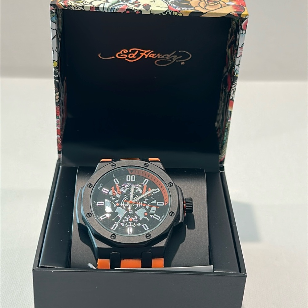 New in Box Ed Hardy Men’s Black Face Watch with Hour, Minute and Second hands.